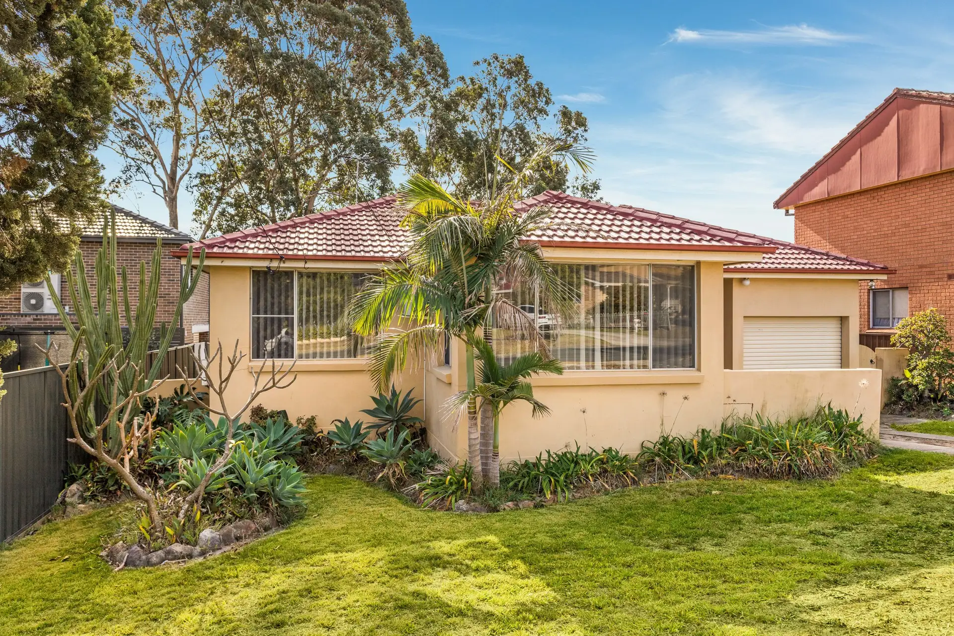 86 Rex Road, Georges Hall Sold by Richard Matthews Real Estate - image 1