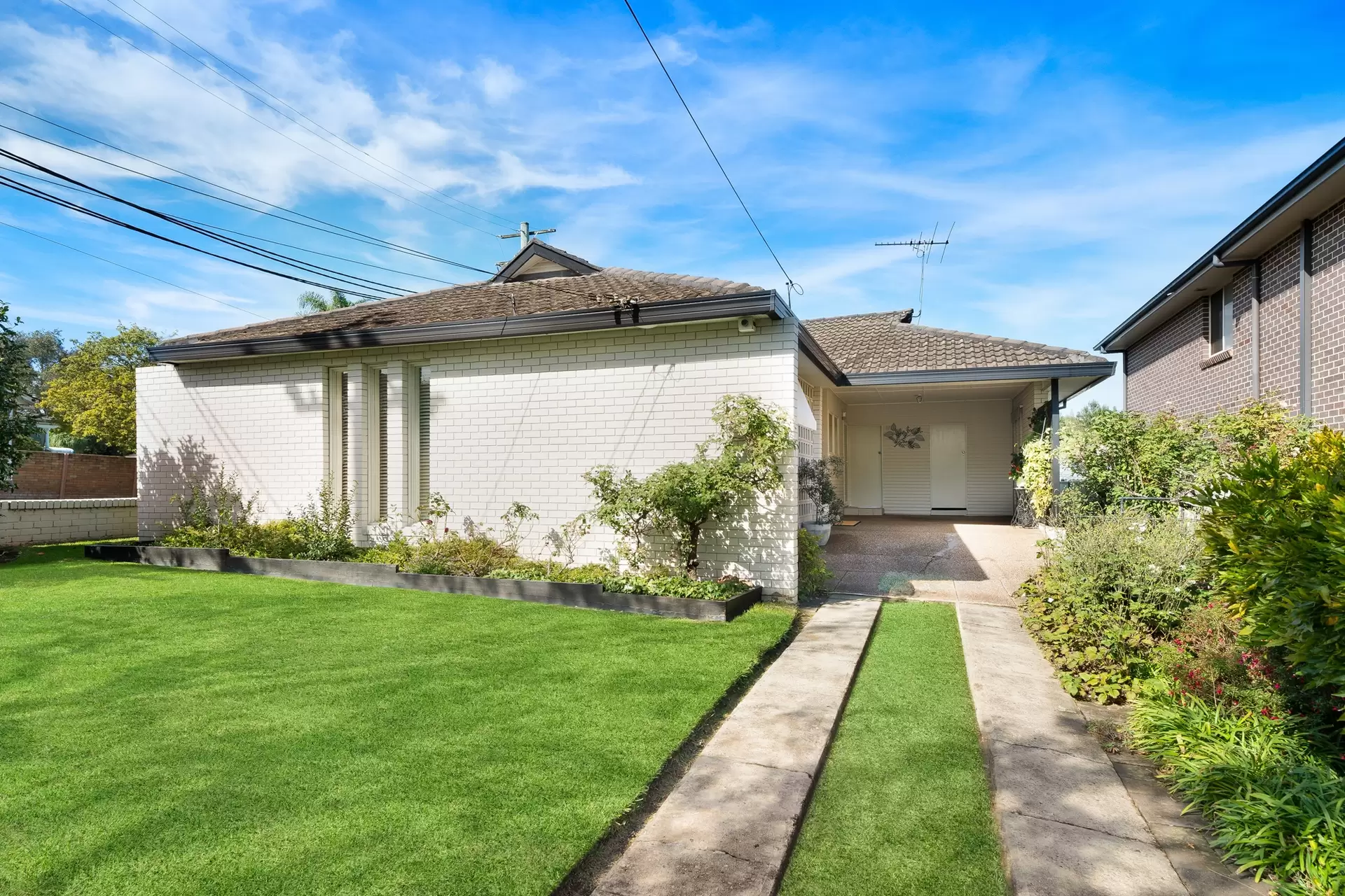 131 Flinders Road, Georges Hall Auction by Richard Matthews Real Estate - image 1